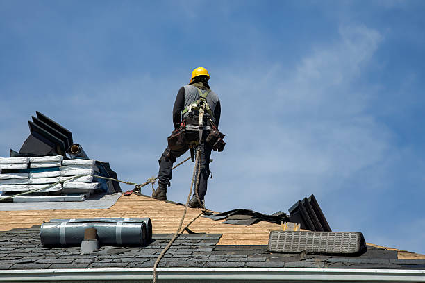 Professional Roofing technician working in Tolovana Park, OR